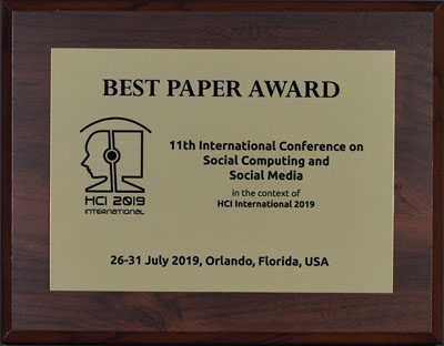 Social Computing and Social Media Best Paper Award. Details in text following the image.